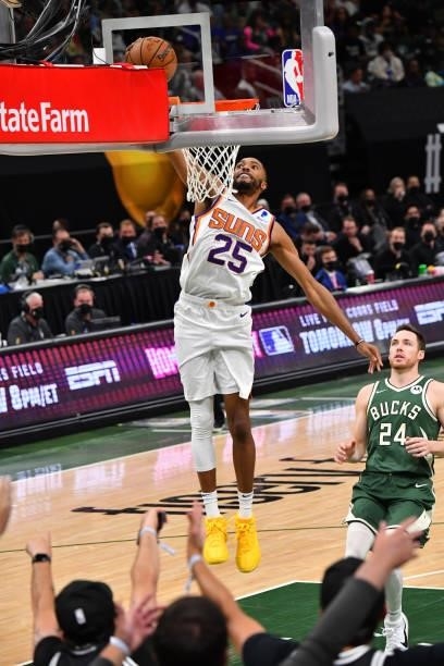 Mikal Bridges of the Phoenix Suns dunks the ball against the Milwaukee Bucks during Game Three of the 2021 NBA Finals on July 11, 2021 at Fiserv...