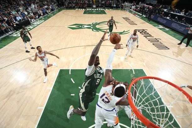 Torrey Craig of the Phoenix Suns blocks the ball against the Milwaukee Bucks during Game Three of the 2021 NBA Finals on July 11, 2021 at the Fiserv...