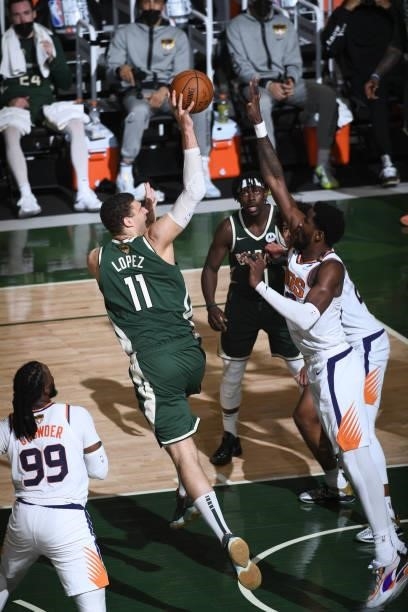 July 11: Brook Lopez of the Milwaukee Bucks shoots the ball against the Phoenix Suns during Game Three of the 2021 NBA Finals on July 11, 2021 at the...