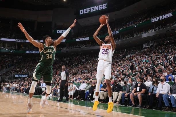 Mikal Bridges of the Phoenix Suns shoots a three point basket against the Milwaukee Bucks during Game Three of the 2021 NBA Finals on July 11, 2021...