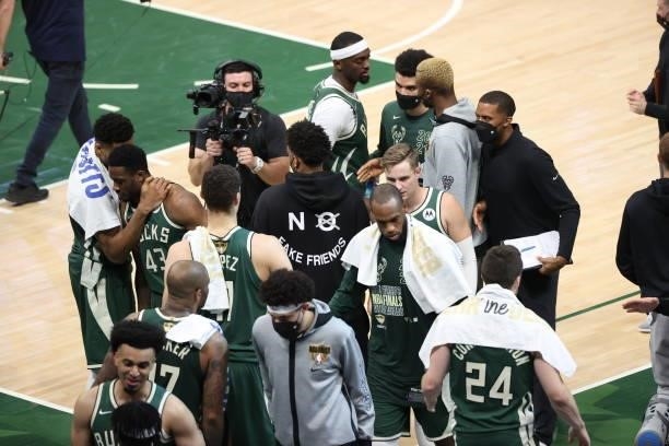 The Milwaukee Bucks huddle up after winning Game Three of the 2021 NBA Finals against the Phoenix Suns on July 11, 2021 at the Fiserv Forum Center in...