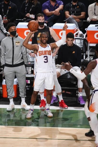 Chris Paul of the Phoenix Suns handles the ball during the game against the Milwaukee Bucks during Game Three of the 2021 NBA Finals on July 11, 2021...