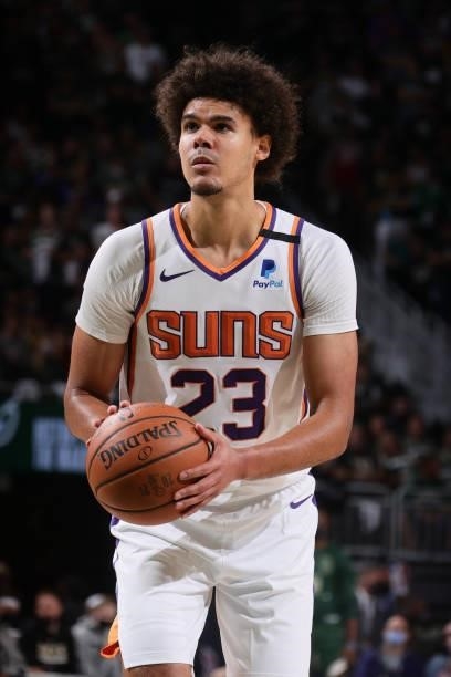 Cameron Johnson of the Phoenix Suns shoots a free throw during Game Three of the 2021 NBA Finals on July 11, 2021 at the Fiserv Forum Center in...
