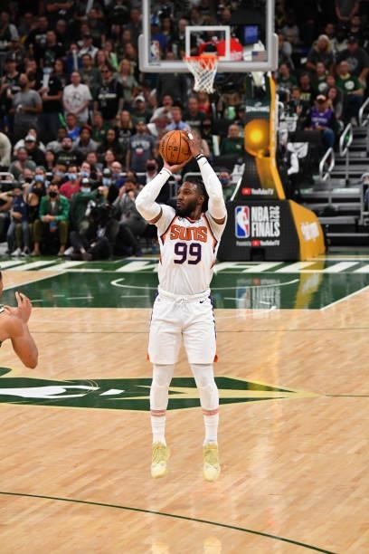 Jae Crowder of the Phoenix Suns shoots a three-pointer against the Milwaukee Bucks during Game Three of the 2021 NBA Finals on July 11, 2021 at...