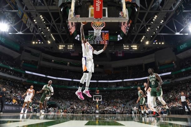 Torrey Craig of the Phoenix Suns drives to the basket during the game against the Milwaukee Bucks during Game Three of the 2021 NBA Finals on July...