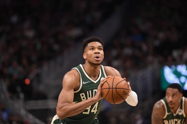 Giannis Antetokounmpo of the Milwaukee Bucks shoots a free throw against the Phoenix Suns during Game Three of the 2021 NBA Finals on July 11, 2021...