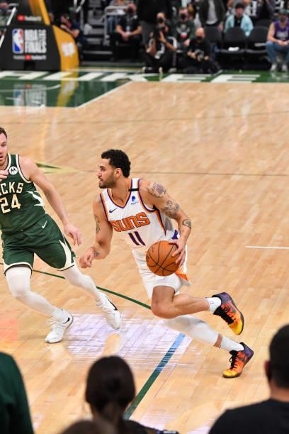 Abdel Nader of the Phoenix Suns handles the ball against the Milwaukee Bucks during Game Three of the 2021 NBA Finals on July 11, 2021 at Fiserv...