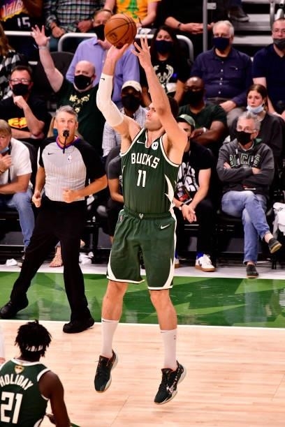 July 11: Brook Lopez of the Milwaukee Bucks shoots a three point basket against the Phoenix Suns during Game Three of the 2021 NBA Finals on July 11,...