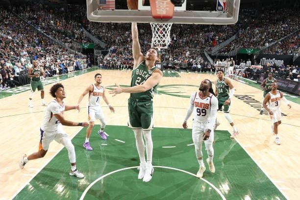 Pat Connaughton of the Milwaukee Bucks shoots the ball against the Phoenix Suns during Game Three of the 2021 NBA Finals on July 11, 2021 at the...
