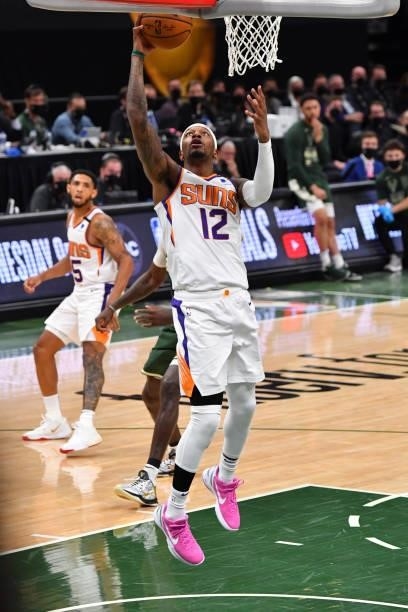 Torrey Craig of the Phoenix Suns shoots the ball against the Milwaukee Bucks during Game Three of the 2021 NBA Finals on July 11, 2021 at Fiserv...