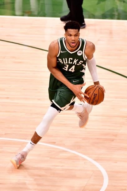 July 11: Giannis Antetokounmpo of the Milwaukee Bucks handles the ball against the Phoenix Suns during Game Three of the 2021 NBA Finals on July 11,...