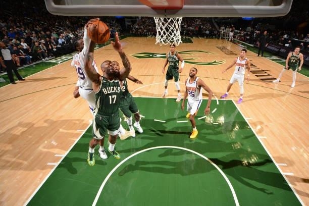 Tucker of the Milwaukee Bucks fights for the ball during Game Three of the 2021 NBA Finals on July 11, 2021 at Fiserv Forum in Milwaukee, Wisconsin....