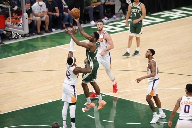 Thanasis Antetokounmpo of the Milwaukee Bucks shoots the ball during the game against the Phoenix Suns during Game Three of the 2021 NBA Finals on...