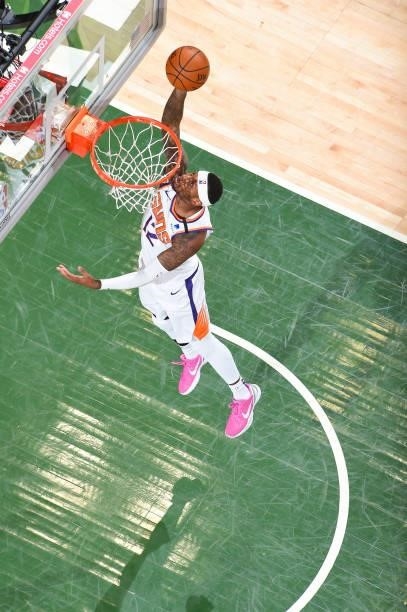 Torrey Craig of the Phoenix Suns drives to the basket during the game against the Milwaukee Bucks during Game Three of the 2021 NBA Finals on July...