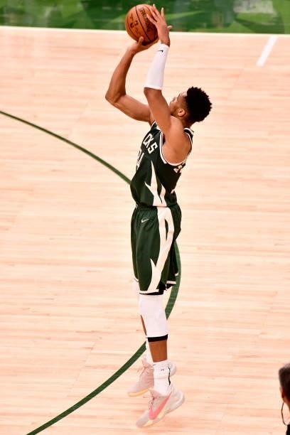July 11: Giannis Antetokounmpo of the Milwaukee Bucks shoots a three point basket against the Phoenix Suns during Game Three of the 2021 NBA Finals...