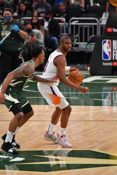 Chris Paul of the Phoenix Suns handles the ball against the Milwaukee Bucks during Game Three of the 2021 NBA Finals on July 11, 2021 at Fiserv Forum...
