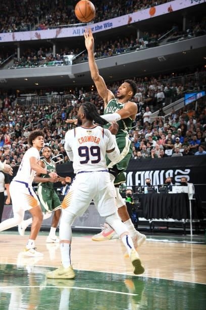 Giannis Antetokounmpo of the Milwaukee Bucks passes the ball during the game against the Phoenix Suns during Game Three of the 2021 NBA Finals on...