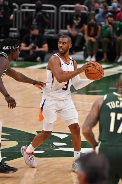 Chris Paul of the Phoenix Suns handles the ball against the Milwaukee Bucks during Game Three of the 2021 NBA Finals on July 11, 2021 at Fiserv Forum...