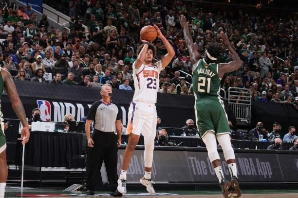 Cameron Johnson of the Phoenix Suns shoots the ball against the Milwaukee Bucks during Game Three of the 2021 NBA Finals on July 11, 2021 at the...