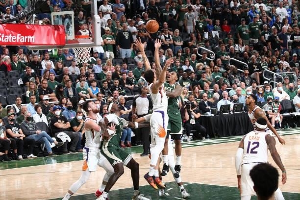 Jeff Teague of the Milwaukee Bucks shoots the ball against the Phoenix Suns during Game Three of the 2021 NBA Finals on July 11, 2021 at the Fiserv...