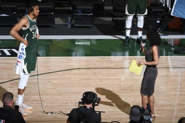 July 11: ESPN sports journalist and reporter, Malika Andrews interviews Giannis Antetokounmpo of the Milwaukee Bucks after Game Three of the 2021 NBA...