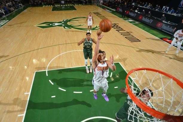 Devin Booker of the Phoenix Suns shoots the ball against the Milwaukee Bucks during Game Three of the 2021 NBA Finals on July 11, 2021 at Fiserv...