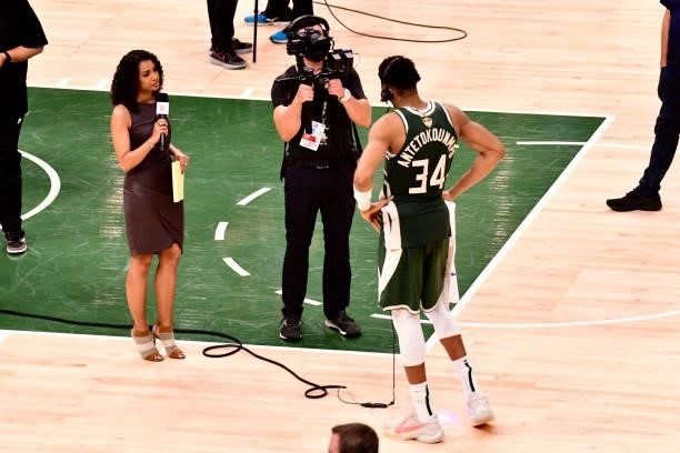 July 11: ESPN sports journalist and reporter, Malika Andrews interviews Giannis Antetokounmpo of the Milwaukee Bucks during Game Three of the 2021...