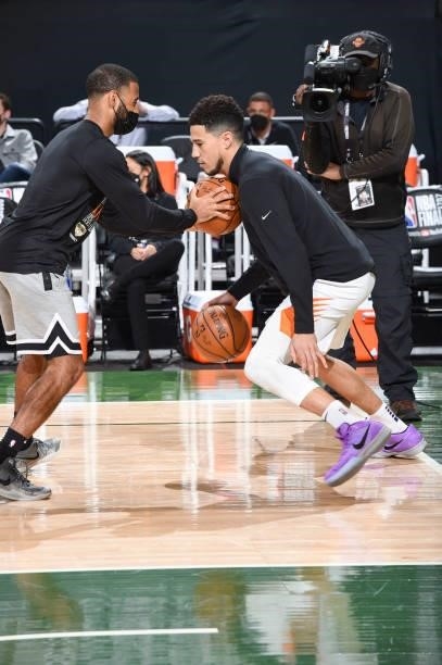 Devin Booker of the Phoenix Suns warms up before the game against the Milwaukee Bucks during Game Three of the 2021 NBA Finals on July 11, 2021 at...