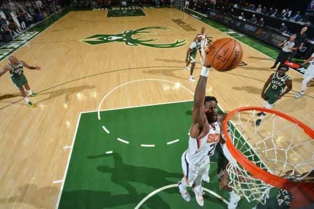 Deandre Ayton of the Phoenix Suns dunks the ball against the Milwaukee Bucks during Game Three of the 2021 NBA Finals on July 11, 2021 at Fiserv...