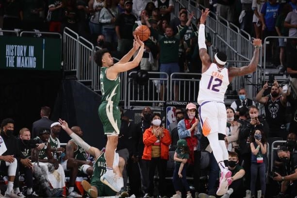 Jordan Nwora of the Milwaukee Bucks shoots a three point basket against the Phoenix Suns during Game Three of the 2021 NBA Finals on July 11, 2021 at...