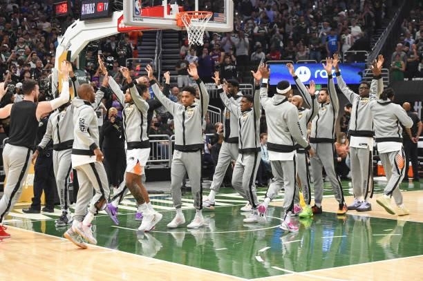 The Phoenix Suns greet each other before the game against the Milwaukee Bucks during Game Three of the 2021 NBA Finals on July 11, 2021 at the Fiserv...
