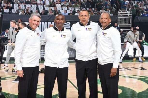 Referee Scott Foster, referee James Williams, referee Curtis Blair and referee Eric Lewis pose for a photo before the game between the Milwaukee...