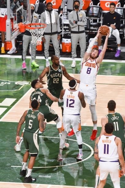 Frank Kaminsky of the Phoenix Suns rebounds the ball during the game against the Milwaukee Bucks during Game Three of the 2021 NBA Finals on July 11,...