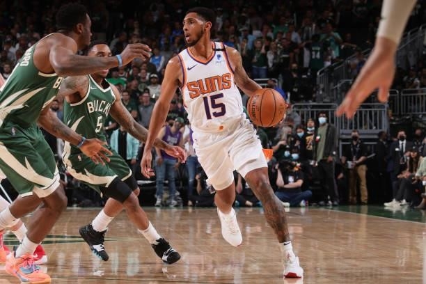 Cameron Payne of the Phoenix Suns dribbles the ball during Game Three of the 2021 NBA Finals on July 11, 2021 at the Fiserv Forum Center in...