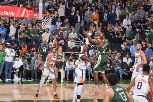 Thanasis Antetokounmpo of the Milwaukee Bucks shoots the ball against the Phoenix Suns during Game Three of the 2021 NBA Finals on July 11, 2021 at...