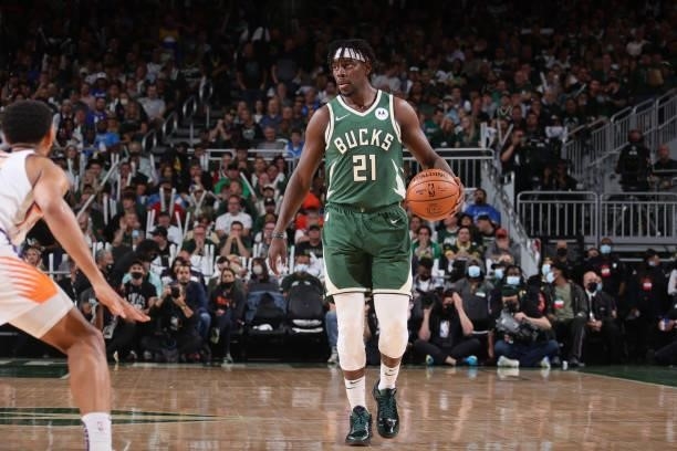 Jrue Holiday of the Milwaukee Bucks dribbles the ball during Game Three of the 2021 NBA Finals on July 11, 2021 at the Fiserv Forum Center in...