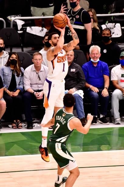 July 11: Abdel Nader of the Phoenix Suns shoots a three point basket against the Milwaukee Bucks during Game Three of the 2021 NBA Finals on July 11,...