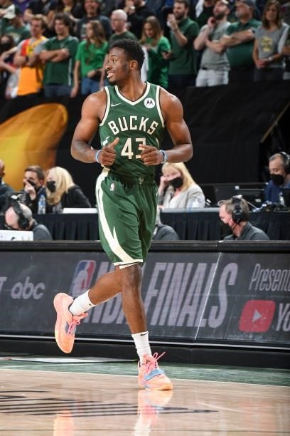 Thanasis Antetokounmpo of the Milwaukee Bucks smiles during the game against the Phoenix Suns during Game Three of the 2021 NBA Finals on July 11,...