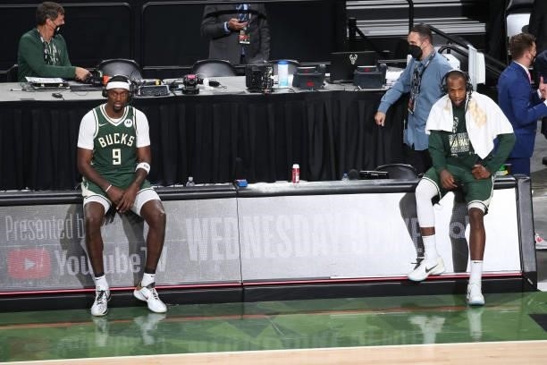 Bobby Portis and Khris Middleton of the Milwaukee Bucks are interviewed after the game against the Phoenix Suns during Game Three of the 2021 NBA...