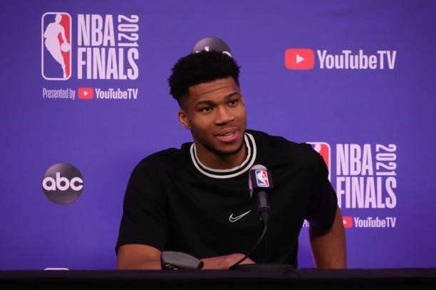 Giannis Antetokounmpo of the Milwaukee Bucks talks with the media after the game against the Phoenix Suns during Game Three of the 2021 NBA Finals on...