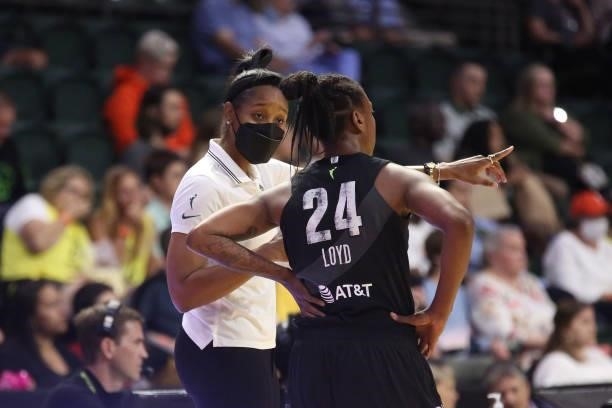 Head Coach, Noelle Quinn talks with Jewell Loyd of the Seattle Storm during the game against the Phoenix Mercury on July 11, 2021 at the Angel of the...
