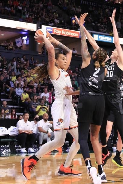 Brittney Griner of the Phoenix Mercury looks to pass the ball against the Seattle Storm on July 11, 2021 at the Angel of the Winds Arena, in Everett,...