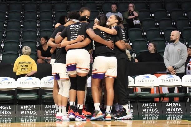 The Phoenix Mercury huddle up before the game against the Seattle Storm on July 11, 2021 at the Angel of the Winds Arena, in Everett, Washington....