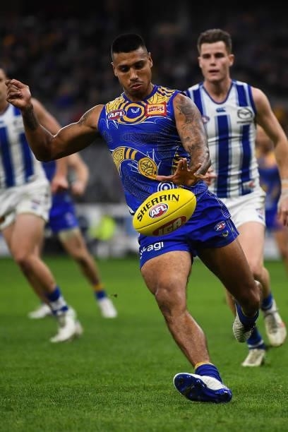 Tim Kelly of the Eagles kicks the ball during the 2021 AFL Round 17 match between the West Coast Eagles and the North Melbourne Kangaroos at Optus...