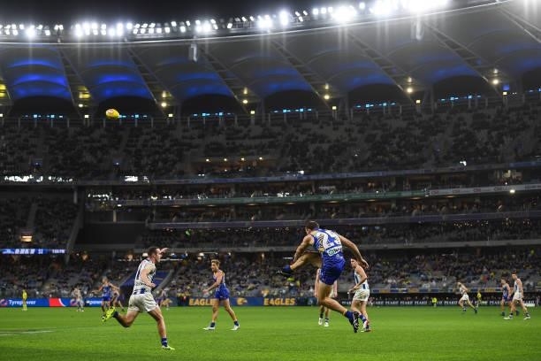 Shannon Hurn of the Eagles kicks the ball during the 2021 AFL Round 17 match between the West Coast Eagles and the North Melbourne Kangaroos at Optus...