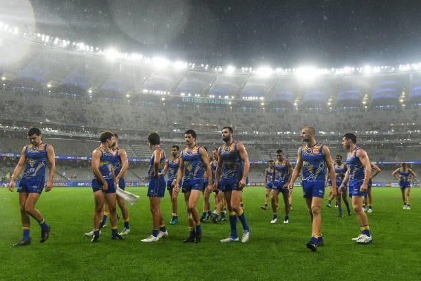 The Eagles leave the field after the loss during the 2021 AFL Round 17 match between the West Coast Eagles and the North Melbourne Kangaroos at Optus...