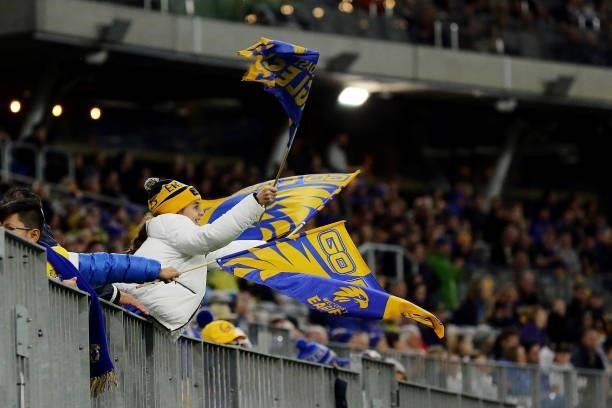 Eagles fans show their support during the 2021 AFL Round 17 match between the West Coast Eagles and the North Melbourne Kangaroos at Optus Stadium on...