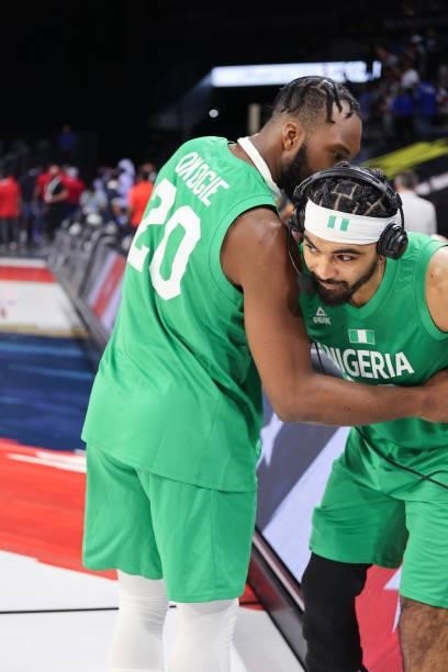 Josh Okogie of the Nigeria Men's National Team talks to Gabe Vincent of the Nigeria Men's National Team after the game against the USA Men's National...