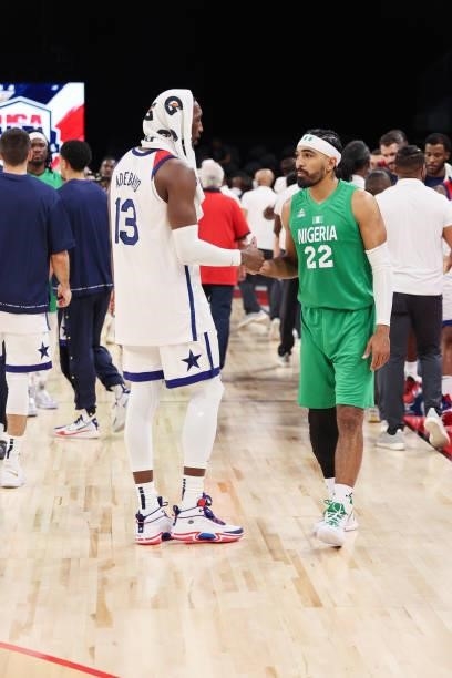 Bam Adebayo of the USA Men's National Team high fives Gabe Vincent of the Nigeria Men's National Team after the game on July 10, 2021 at Michelob...