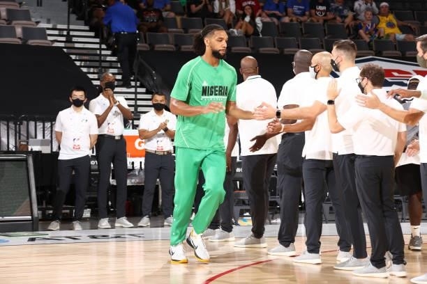 Jahlil Okafor of the Nigeria Men's National Team high fives his coaches before the game against the USA Men's National Team on July 10, 2021 at...